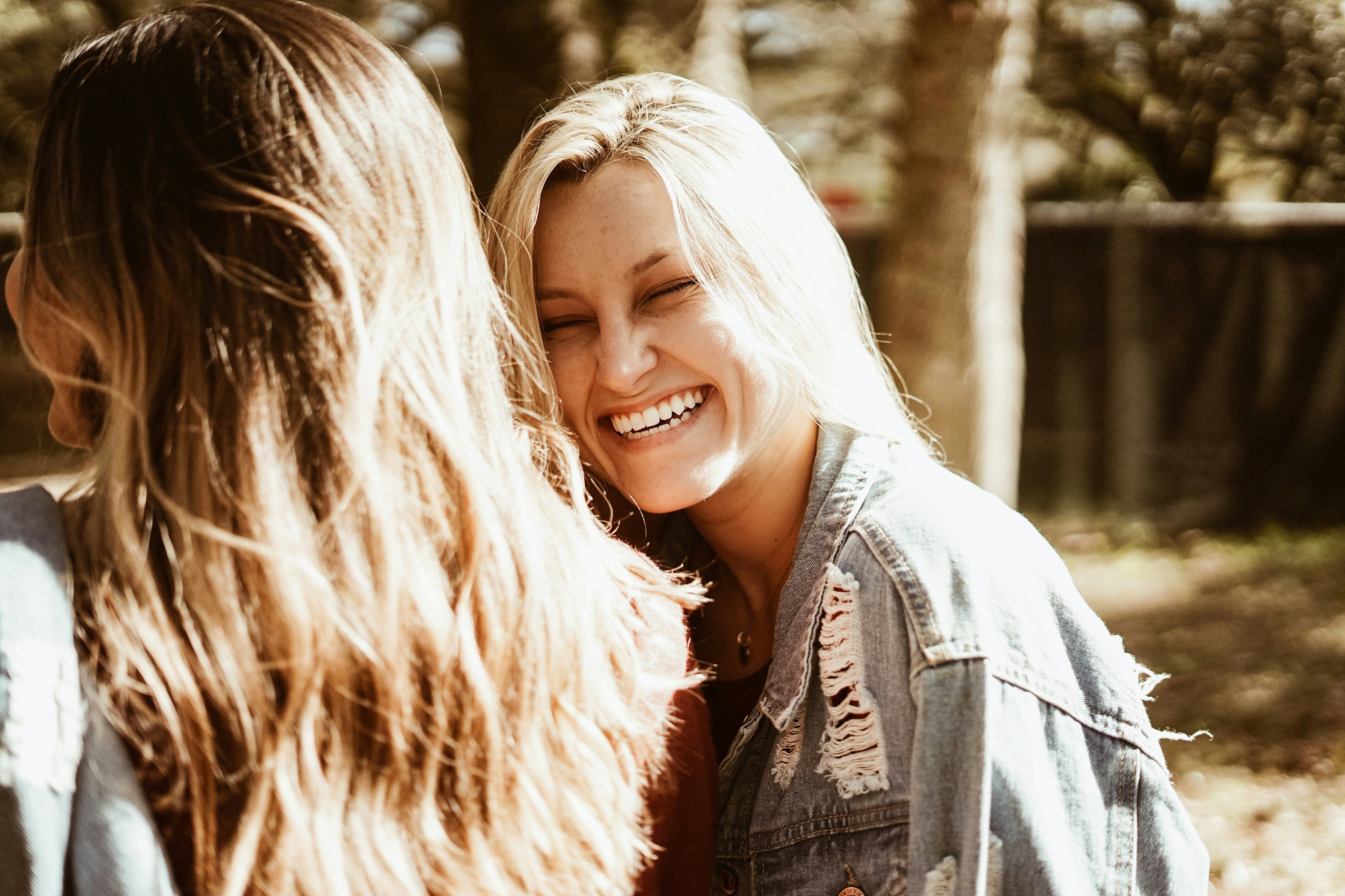 Women laughing together in nature